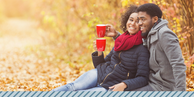 couple outside drinking coffee