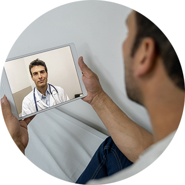 man on a telemedicine appointment with his doctor